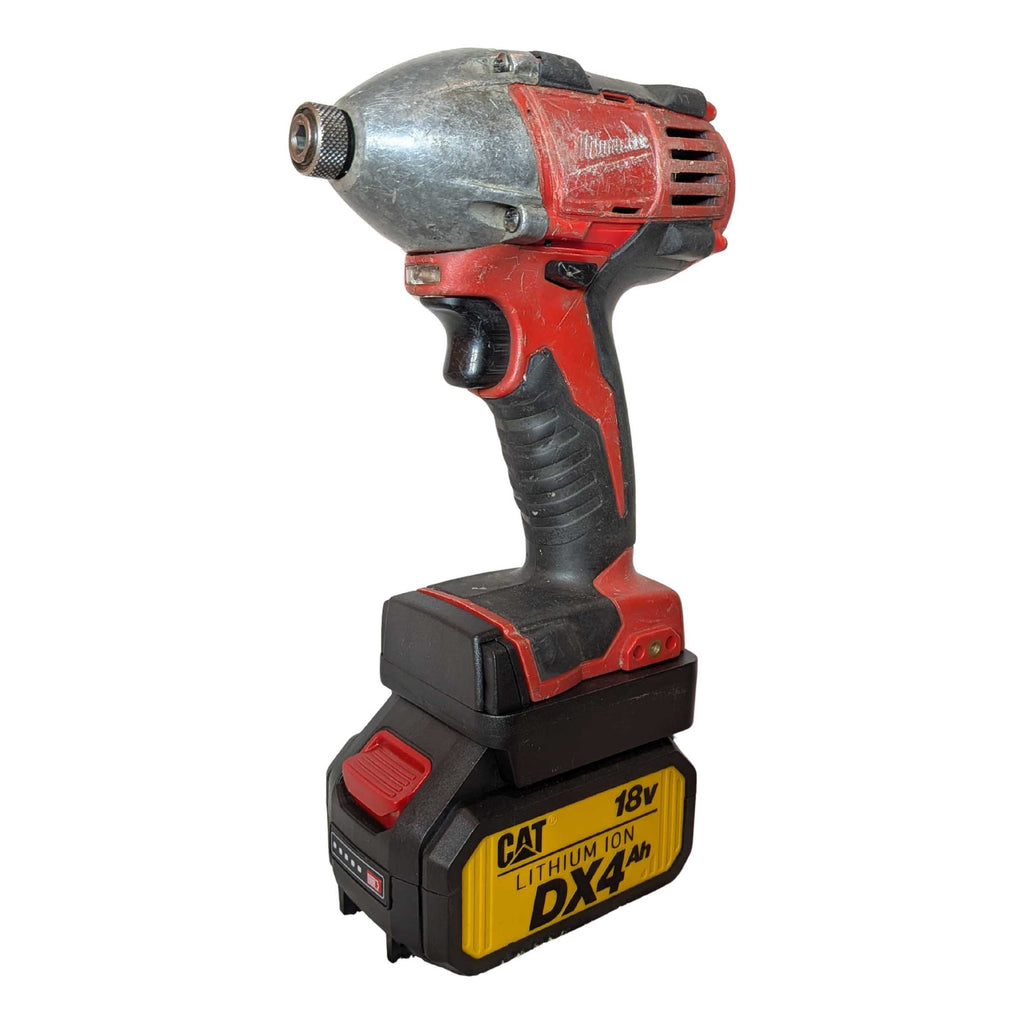 CAT 18V to Milwaukee M18 battery adapter - installed on an impact driver with the battery fitted below