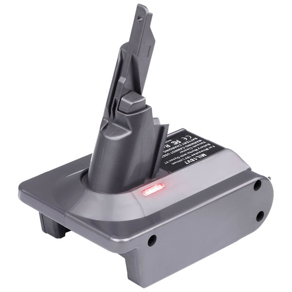 Craftsman 20V to Dyson V8 battery adapter - tool-side post over the battery-side base, with the indicator light lit