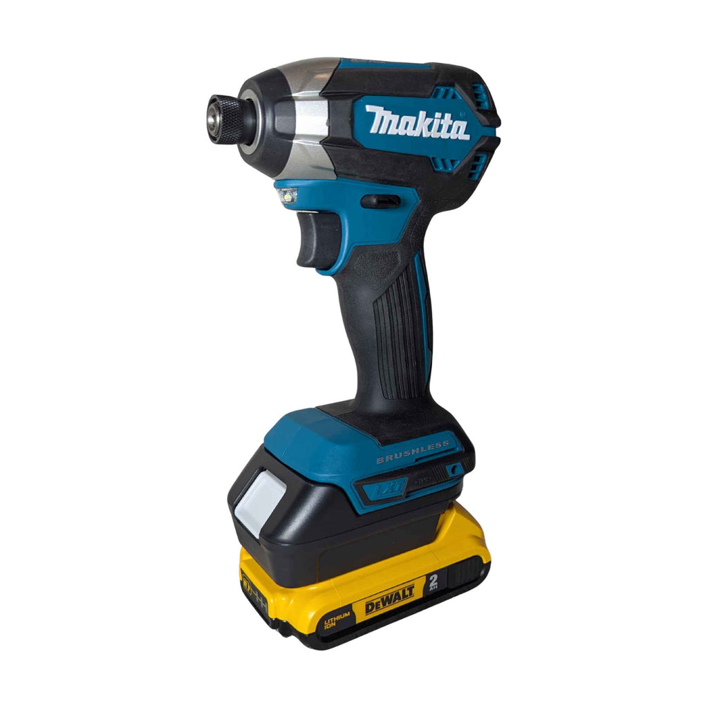 DeWalt 20V MAX to Makita 18V LXT battery adapter - installed on a Makita impact driver with the DeWalt battery attached
