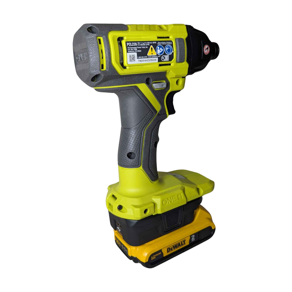 DeWalt 20V MAX to Ryobi 18V ONE+ battery adapter - installed on a Ryobi impact driver, rear view