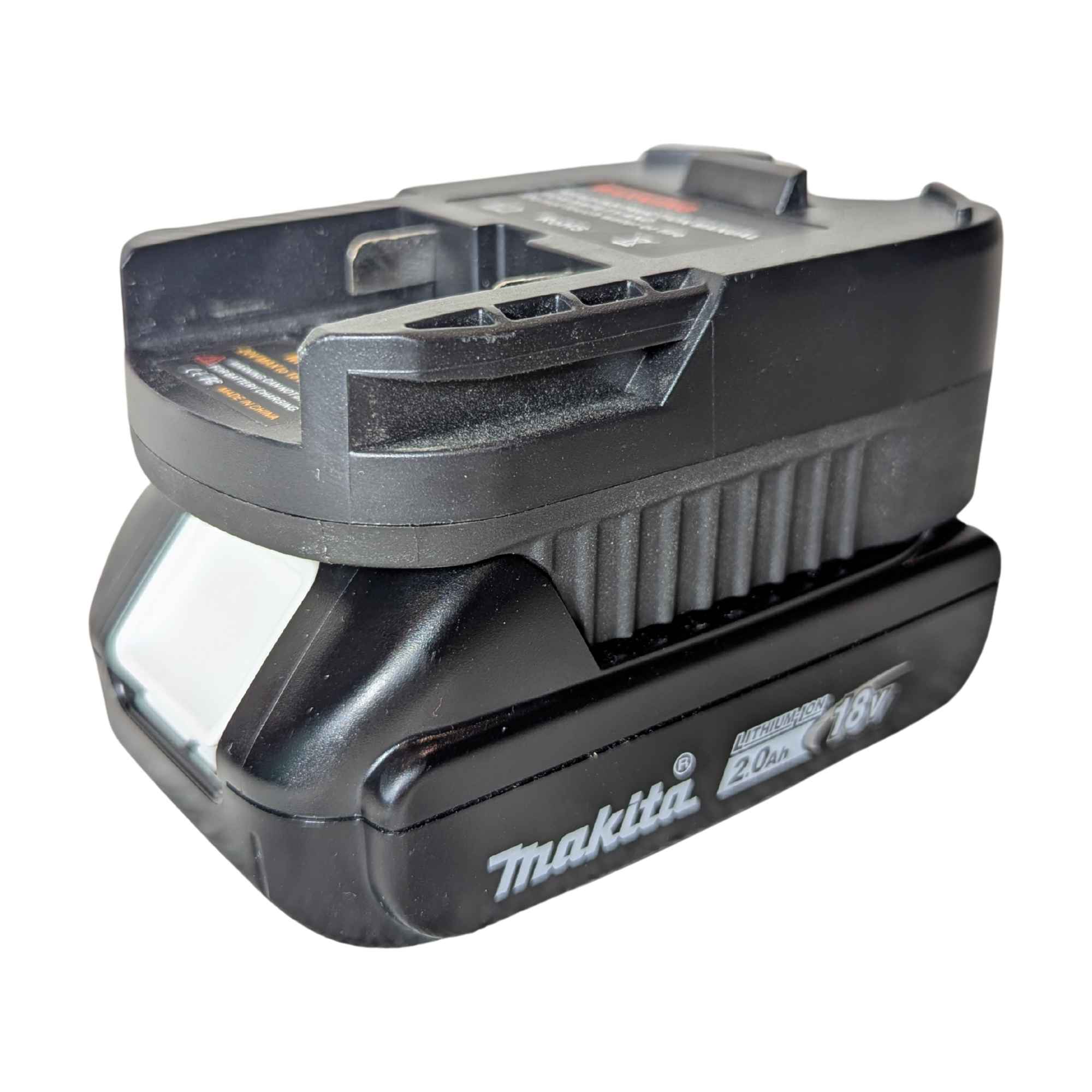 Makita 18V LXT to RIDGID 18V battery adapter - fitted to the Makita 18V LXT battery, warning label and vent ribs
