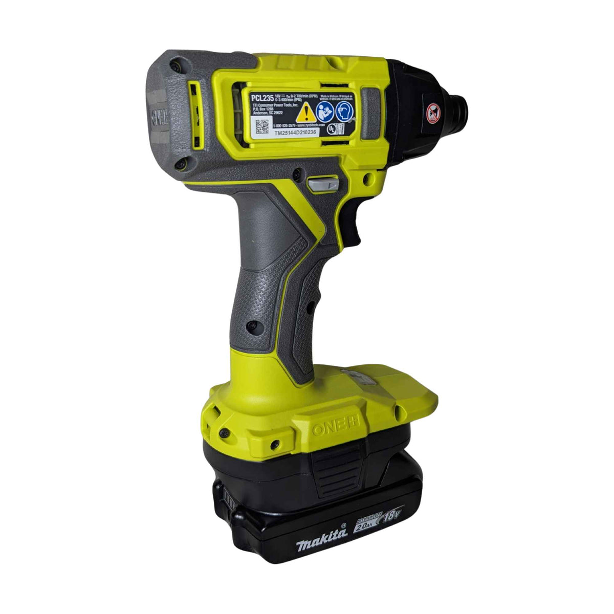 Makita 18V LXT to Ryobi 18V ONE+ battery adapter - installed on a Ryobi impact driver, rear view