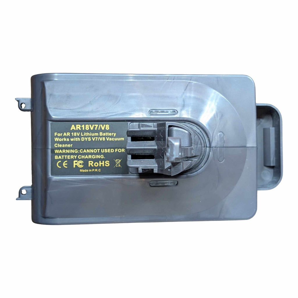 RIDGID 18V to Dyson V8 battery adapter - plan view of the top face, Dyson tool-side stem base and warning label