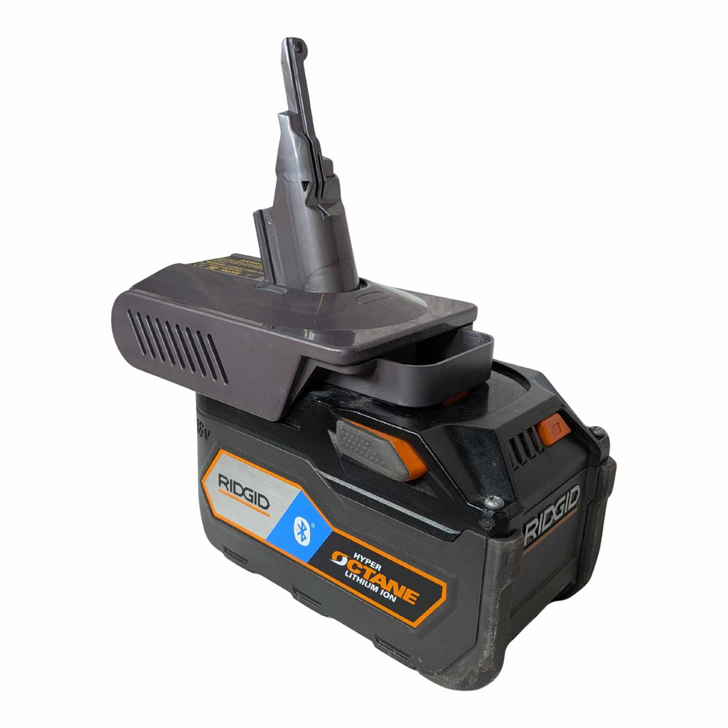 RIDGID 18V to Dyson V8 battery adapter - fitted to the RIDGID 18V battery, Dyson tool-side stem upward, side vent grille